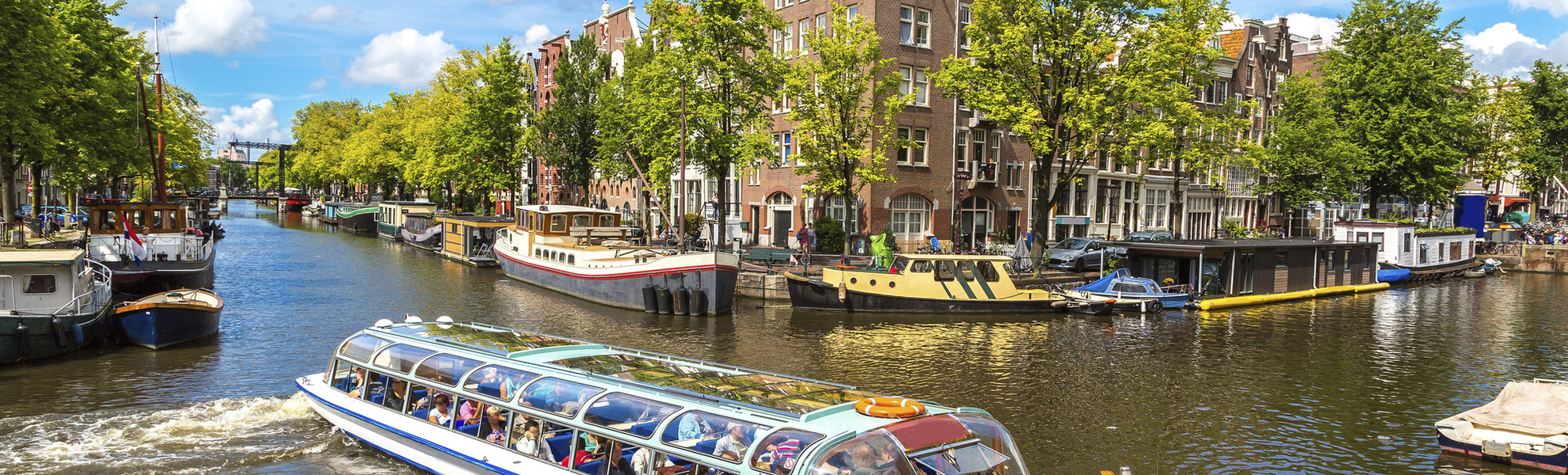 Grachtenrundfahrt in Amsterdam - © shutterstock_246545398
